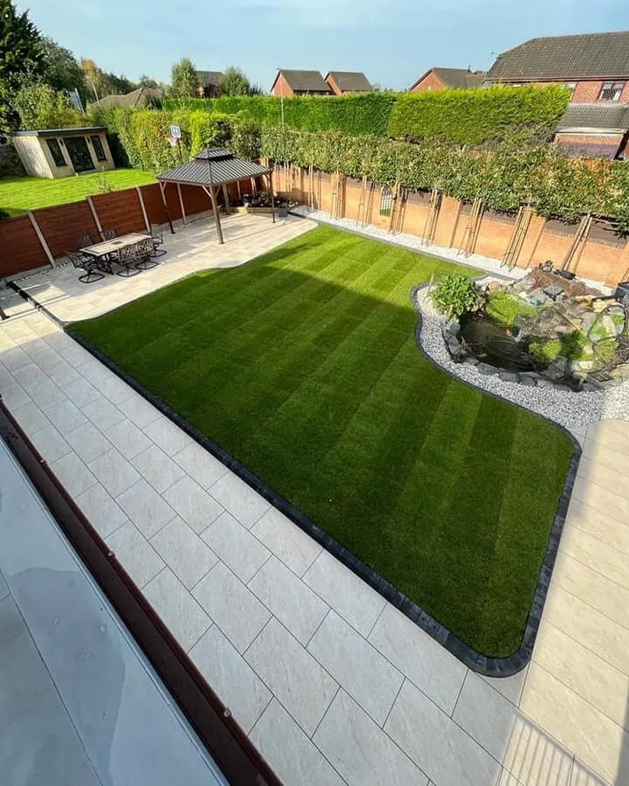 Lawn and patio with planted border